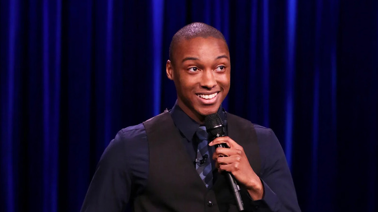 Josh Johnson performing live on stage
